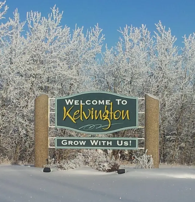Kelvington welcome sign in winter frost